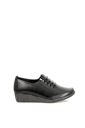Siyah Cilt Lastik Bağcıklı Dolğu Topuk Bayan Ayakkabı