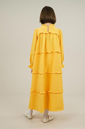 Genç Kız Geniş Kesim Katlı Fırfırlı Kolları Lastikli Elbise Sarı