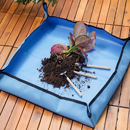 TİNEKE Çiçek saksı toprağı aktarımı için su geçirmez ped  75x100 cm 1 adet mavi