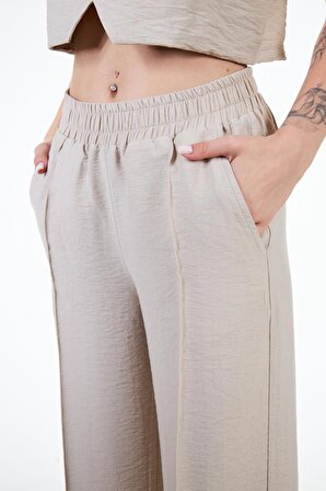 Bej Kadın Keten Görünümlü Nervür Detaylı Bol Kalıp Wide Leg Pantolon - Nomte